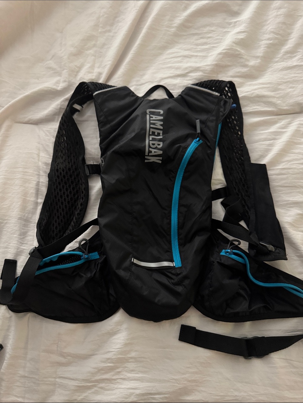 CamelBak Black Hydration Pack with Blue Zipper Accents